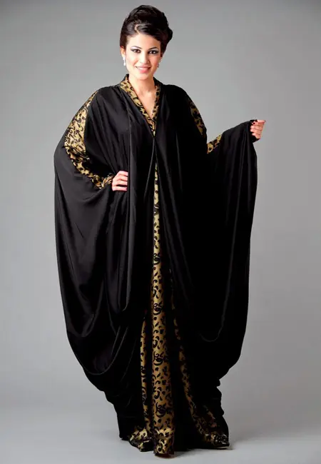 abaya design with golden buttons and patches